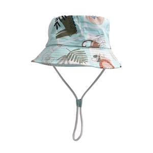 Detail of blue cotton kids sun hat with lion and monkey prints and adjustable chin strap