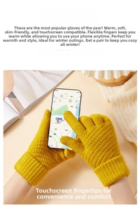 Close-up of bright yellow pineapple knit gloves featuring touchscreen fingertips on a phone