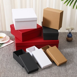 Close-up of premium gift boxes in red, black, white and kraft paper colors