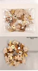 Detail view of artificial maple leaf wreath with white pumpkins measuring 37cm in diameter