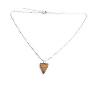 Polished tiger eye stone necklace with triangular pendant on silver metal chain