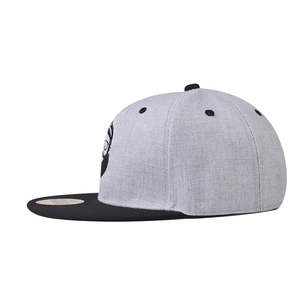 Close-up of gray cotton baseball cap featuring black brim and cartoon mustache embroidery