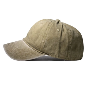 Detail of washed khaki cotton baseball cap showing side profile and reinforced brim stitching