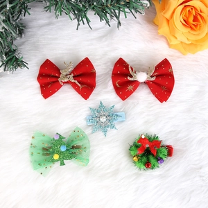 5-piece Christmas hair clip set featuring red velvet bows, antlers, and festive decorations