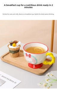 Detailed relief of pink cartoon character on ceramic mug with yellow twisted handle