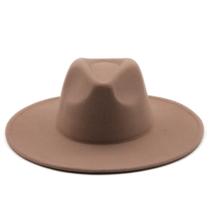 Detail of a brown wool felt jazz hat showing its wide flat brim and classic indented crown