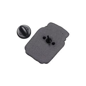 Detail view of the black enamel metal brooch back with secure rubber butterfly clutch