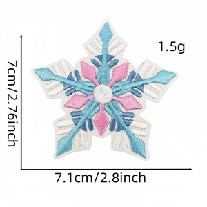Detail view of snowflake embroidery patch in white and blue with precise 7cm dimensions