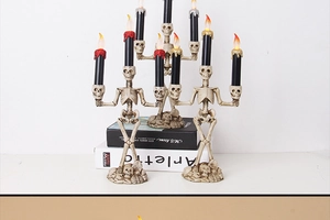 Halloween skull double candle holder with LED flickering flame and wax drip details
