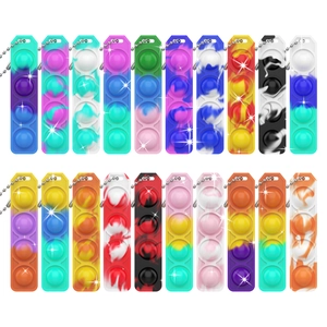 Array of colorful tie-dye silicone sensory pop fidget toys with metal keychain chains