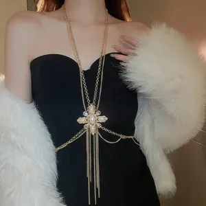 Luxurious gold body chain with pearl flower motifs and long layered tassels for women