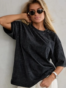 Detailed texture of charcoal grey acid wash oversized cotton t-shirt with vintage finish