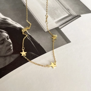 Elegant 925 sterling silver gold plated necklace with five minimalist star pendants