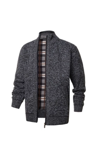 Detail of dark grey knit cardigan showing stand collar and plaid fleece lining texture