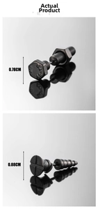 Macro shot of industrial black screw and bolt stud earrings with engraved technical details