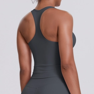 Detail of grey racerback sports tank top showing seamless fit and breathable fabric