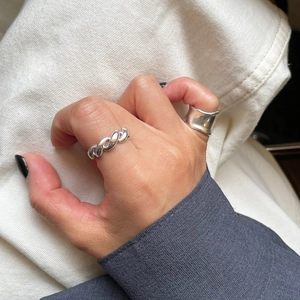 925 sterling silver rope twist and wide concave ring set worn on model hand