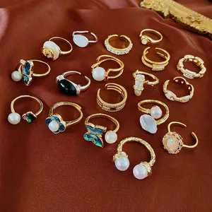Elegant gold plated open ring set with butterfly mother of pearl and zircon stones