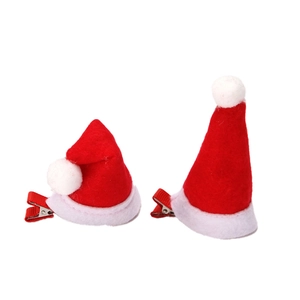 Mini Christmas hat hair clips set in red and white felt on a clean white background