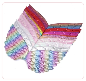 Detail showing various colors and quilted feather textures of shiny fairy wing props