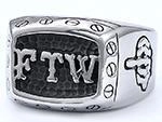 Macro view of vintage stainless steel biker ring featuring FTW engraving and relief