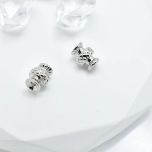 Silver vase spacer bead with diamond texture and hourglass shape for DIY jewelry making