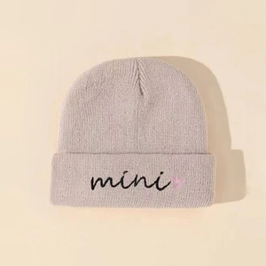 Kids casual beige knit beanie featuring mini embroidery and heart detail for winter
