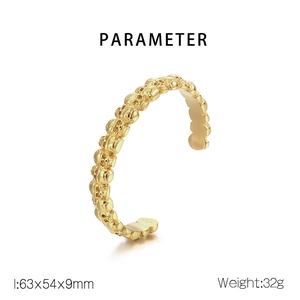 Detailed view of 316L gold skull cuff bracelet with size parameters and weight info