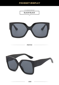 Vistas frontal y lateral de gafas de sol cuadradas grandes negras con lentes ahumadas