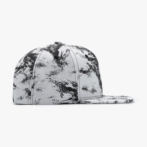 Flat brim snapback hat with black and white abstract splash ink pattern and embroidery