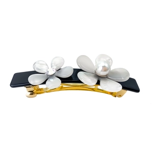 Floral hair clip with black base, white flowers, sparkling rhinestones and elegant pearls