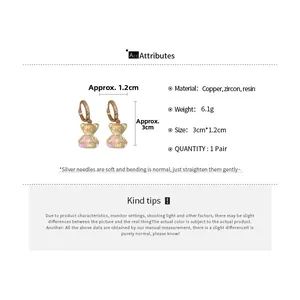 Tableau détaillé des tailles et matériaux pour boucles d'oreilles ours avec zircons