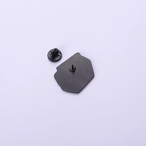 Back view of black alloy milk box brooch with durable rubber clutch pin back