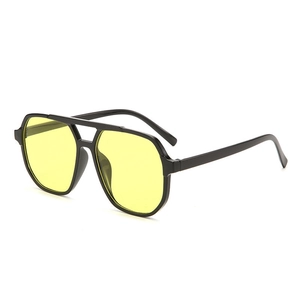 Classic oversized double bridge pilot sunglasses with black frame and yellow tinted lenses