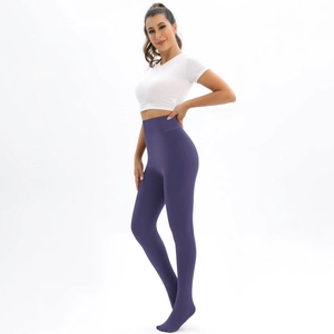 Detailed side view of high waist thermal leggings showing compression and tummy control fit