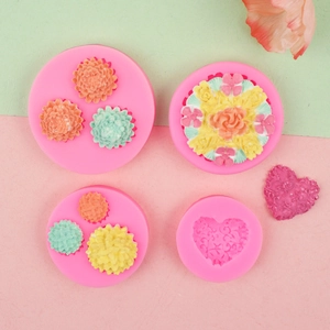 Pink silicone mold for 3D flowers and hearts used in fondant and DIY baking crafts