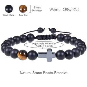 8mm natural matte stone and tiger eye bracelet with metal cross on a card