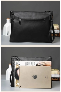 Detail view of black PU leather punk clutch showing interior capacity for iPad and magazines