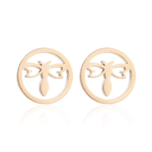 Detail of golden circular dragonfly studs with hollow design and polished metallic finish