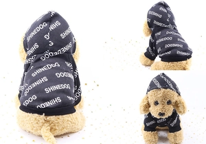Detailed views of black hooded pet sweatshirt with white Shinedog letter print