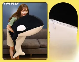 Detailed close-up of the smooth hidden zipper on this plush orca whale toy for easy washing