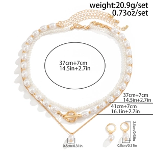 Detailed size chart for layered pearl necklace set with OT buckle and gold heart charms