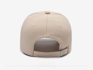 Rear view of beige baseball cap featuring adjustable metal buckle and woven fabric texture
