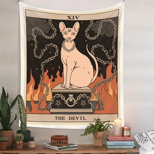 Detail of The Devil tarot tapestry featuring a hairless cat design on a white wall