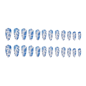 Blue and white floral almond press-on nails with 24 pieces in a minimalist porcelain style