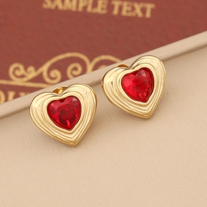 Fashionable gold-plated heart stud earrings with red crystal and rippled edges
