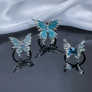 Three-piece set of irregular blue butterfly open rings with silver metallic finish