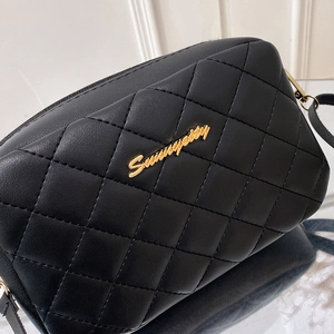 Classic black quilted shoulder bag with golden metal hardware and Sunnycity logo detail