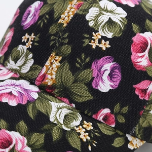 Detailed macro view of the floral print canvas baseball cap with high-density cotton twill