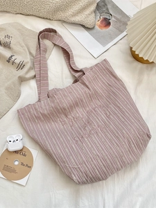 Vertical striped canvas tote bag with pink and beige stripes and special embroidery
